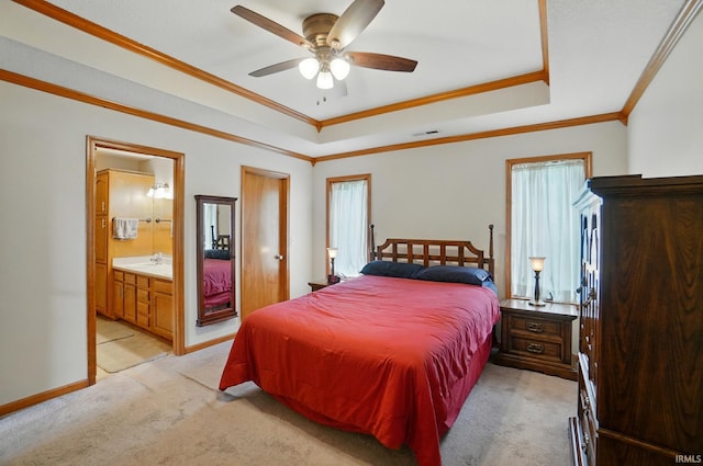 1322 Canal Ridge Dr, New Haven, IN 46774 - bedroom featuring a raised ceiling, light colored carpet, crown molding, ensuite bathroom, and ceiling fan