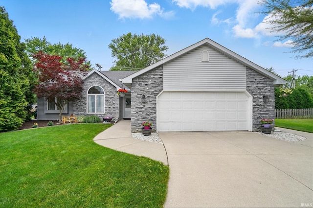 1322 Canal Ridge Dr, New Haven, IN 46774 - view of front of home featuring stone siding, driveway, and a garage