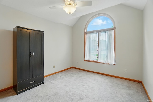1322 Canal Ridge Dr, New Haven, IN 46774 - unfurnished bedroom with lofted ceiling, light colored carpet, and a ceiling fan