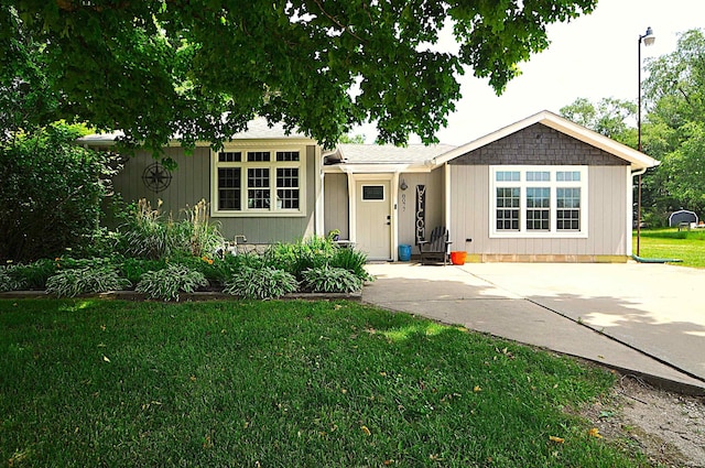 8077 E State Road 4th Rd, Walkerton, IN 46574 - ranch-style home featuring a front lawn