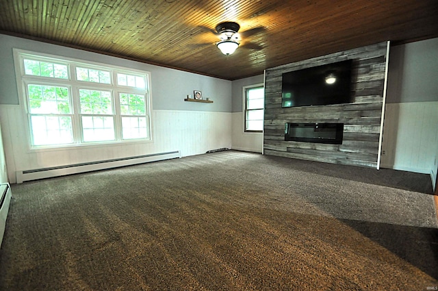 8077 E State Road 4th Rd, Walkerton, IN 46574 - unfurnished living room featuring a baseboard heating unit, wainscoting, wooden ceiling, a large fireplace, and carpet flooring
