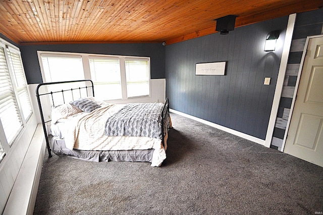 8077 E State Road 4th Rd, Walkerton, IN 46574 - carpeted bedroom featuring wooden ceiling, multiple windows, ornamental molding, and wooden walls