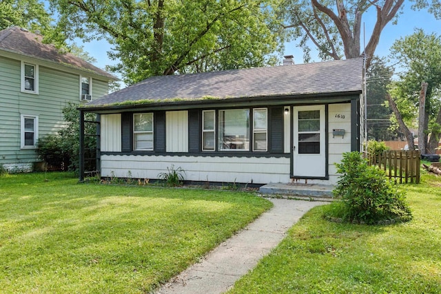 1610 Kentucky Ave, Fort Wayne, IN 46805 - view of front of home featuring roof with shingles and a chimney