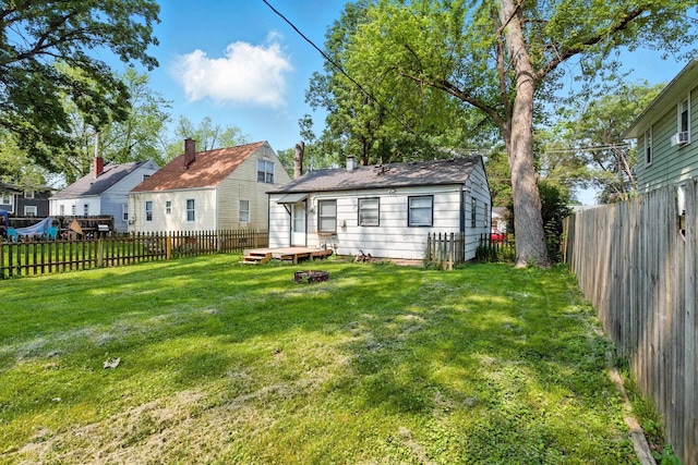 1610 Kentucky Ave, Fort Wayne, IN 46805 - back of property with a fenced backyard and a deck