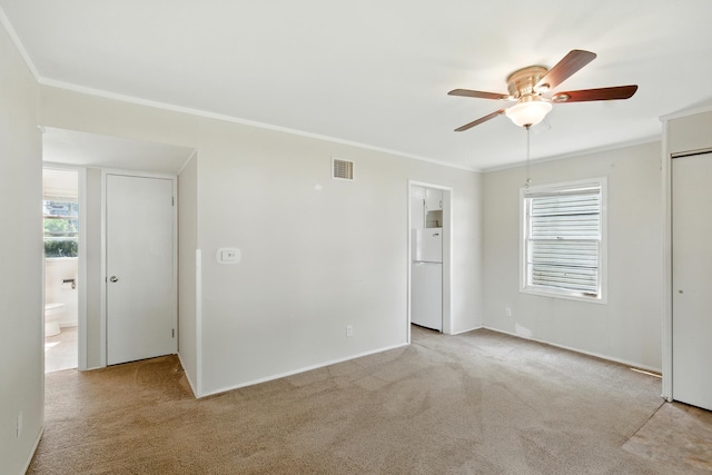 1610 Kentucky Ave, Fort Wayne, IN 46805 - carpeted empty room with a ceiling fan and ornamental molding