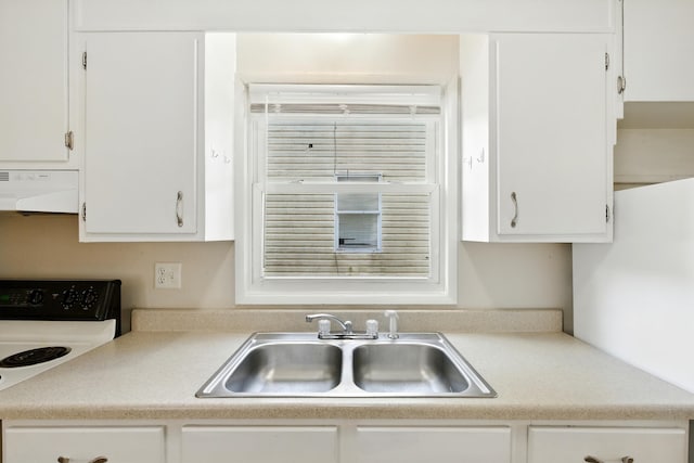1610 Kentucky Ave, Fort Wayne, IN 46805 - kitchen featuring exhaust hood, electric stove, white cabinets, and light countertops