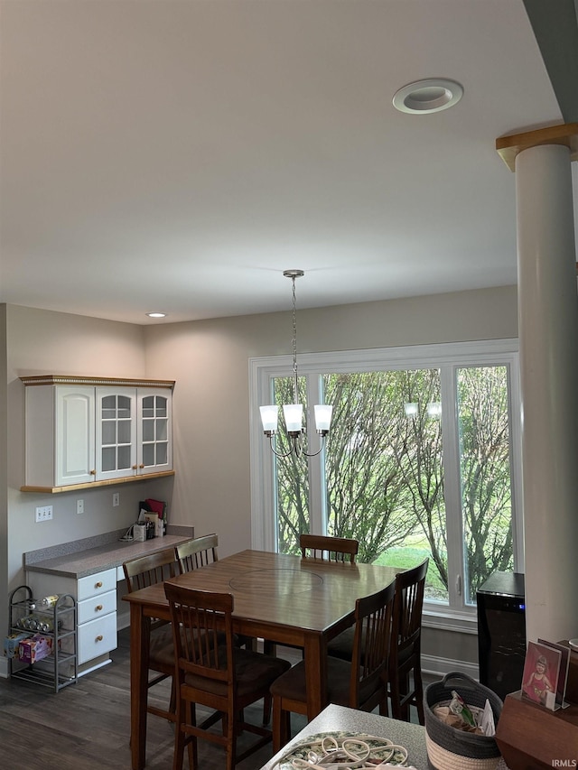 5844 Flagstone Dr, Evansville, IN 47711 - dining area with healthy amount of natural light, a chandelier, dark wood-type flooring, and recessed lighting