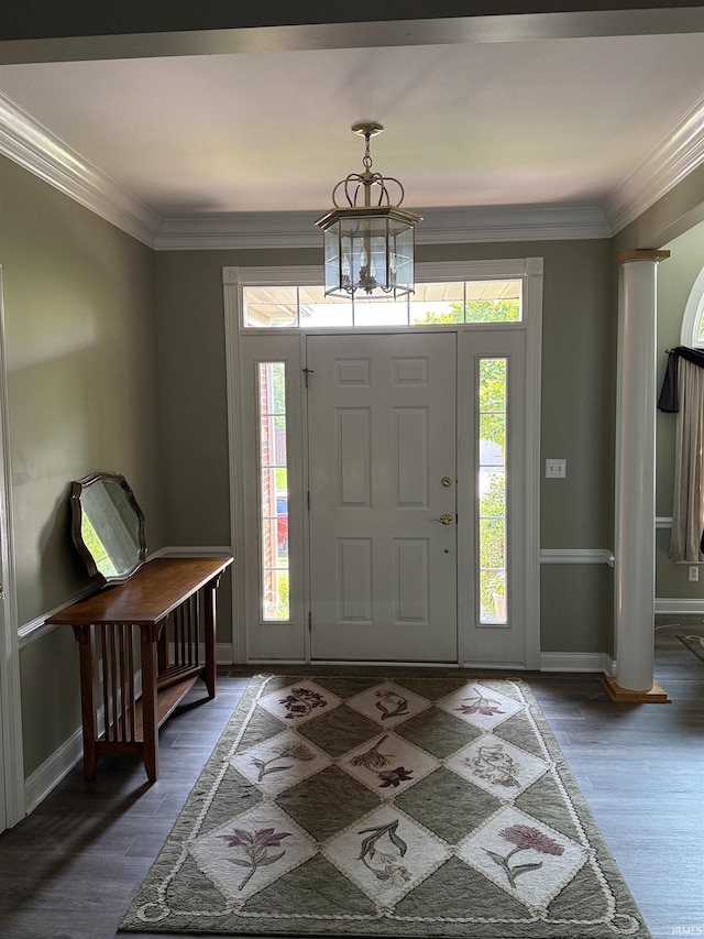 5844 Flagstone Dr, Evansville, IN 47711 - foyer entrance with crown molding, wood finished floors, and a chandelier