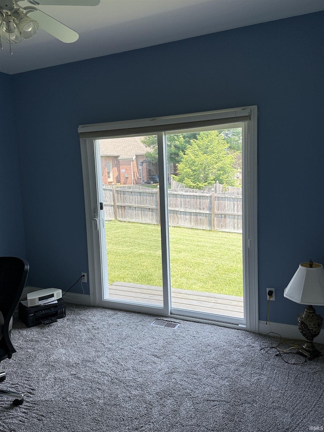 5844 Flagstone Dr, Evansville, IN 47711 - doorway featuring carpet floors and a ceiling fan