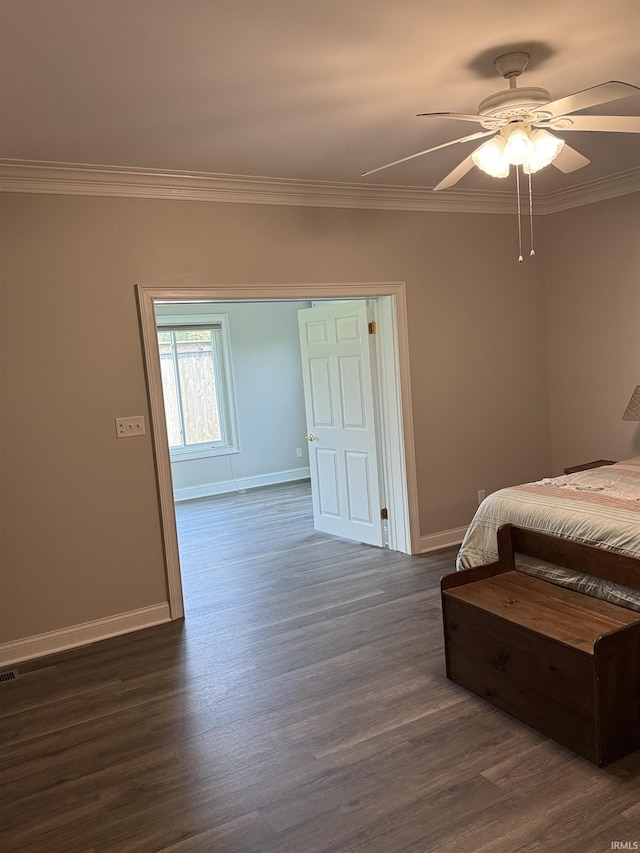 5844 Flagstone Dr, Evansville, IN 47711 - bedroom featuring crown molding, dark wood-style flooring, and ceiling fan