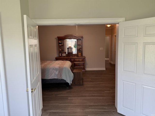 5844 Flagstone Dr, Evansville, IN 47711 - bedroom featuring dark wood-type flooring and baseboards