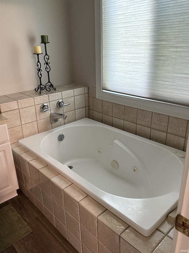 5844 Flagstone Dr, Evansville, IN 47711 - full bath with wood finished floors and a whirlpool tub