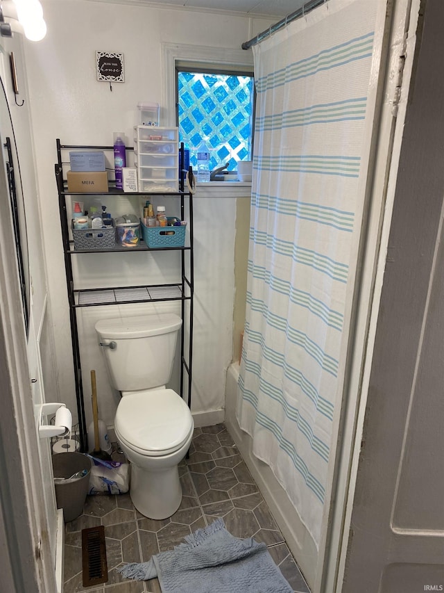506 N Sprunger St, Berne, IN 46711 - full bath with shower / tub combo with curtain and tile patterned floors