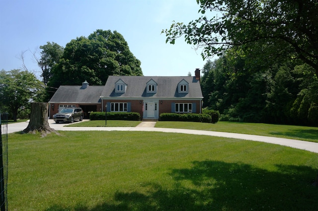 1402 Jackson Rd, South Bend, IN 46614 - cape cod house featuring a chimney, a front lawn, and driveway
