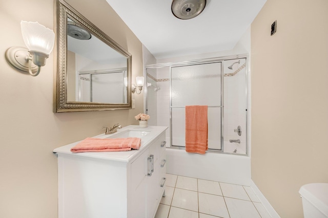1402 Jackson Rd, South Bend, IN 46614 - bathroom with vanity, enclosed tub / shower combo, and tile patterned floors