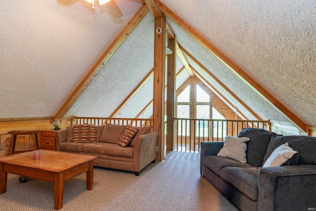 1275 N Sewell Rd, Bloomington, IN 47408 - carpeted living area with a ceiling fan, vaulted ceiling, and a textured ceiling