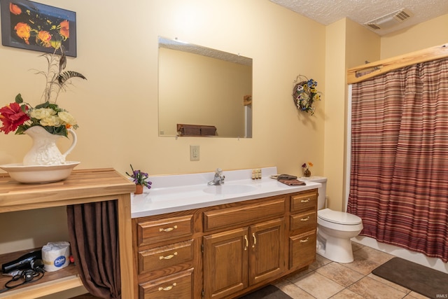 1275 N Sewell Rd, Bloomington, IN 47408 - full bath with vanity, a textured ceiling, tile patterned flooring, and curtained shower
