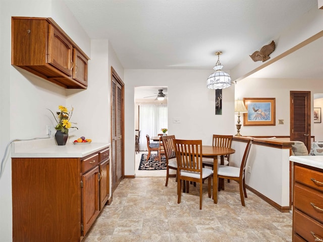 3723 Pebblewood Pl, Fort Wayne, IN 46804 - dining space with ceiling fan and stone finish floors
