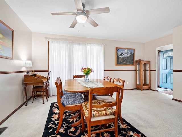 3723 Pebblewood Pl, Fort Wayne, IN 46804 - dining room with light colored carpet, a ceiling fan, and a textured ceiling