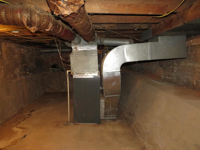 219 Fulton Ave, Rochester, IN 46975 - unfinished below grade area featuring heating unit