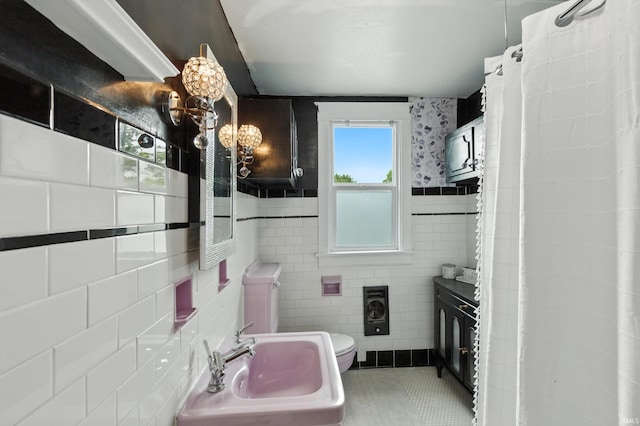 319 W Wiley Ave, Bluffton, IN 46714 - full bath with tile walls and tile patterned flooring