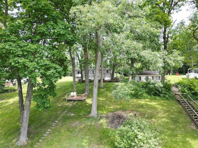 3643 S Bruner Rd, Warsaw, IN 46580 - view of grassy yard with view of scattered trees