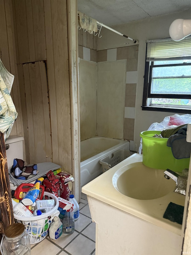 2286 N County Road 200 W, New Castle, IN 47362 - bathroom featuring tub / shower combination, tile patterned floors, wood walls, and vanity