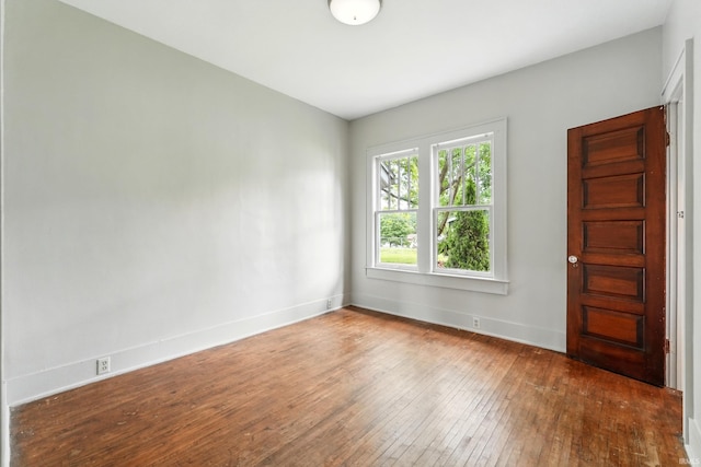 501 E Center St, Warsaw, IN 46580 - unfurnished room featuring hardwood / wood-style flooring and baseboards