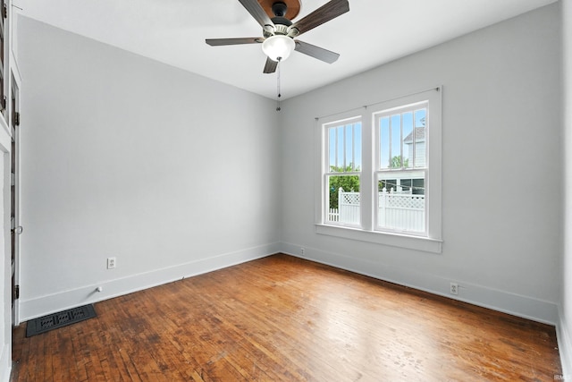 501 E Center St, Warsaw, IN 46580 - unfurnished room featuring hardwood / wood-style flooring and ceiling fan