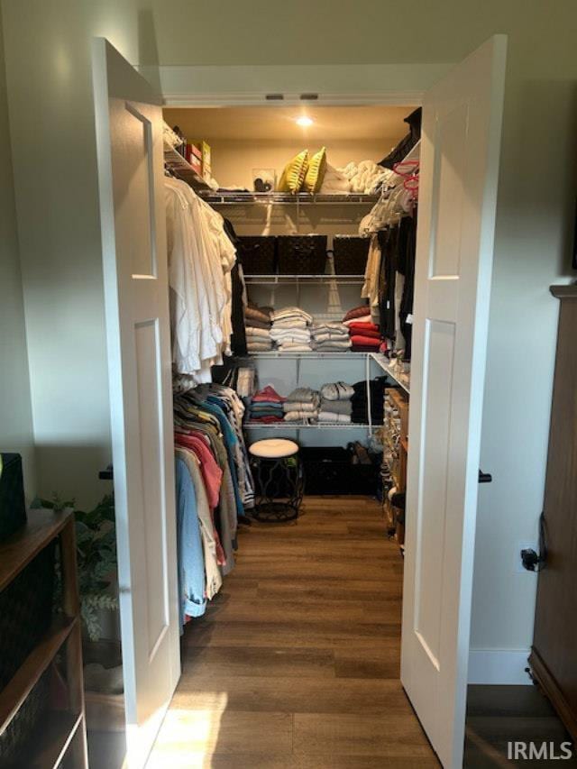 855 Reyling Dr, Jasper, IN 47546 - walk in closet with wood finished floors