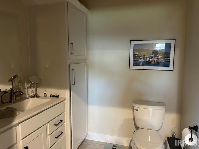 855 Reyling Dr, Jasper, IN 47546 - half bathroom featuring vanity and toilet