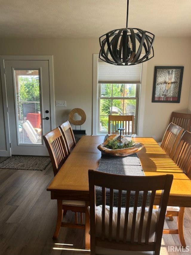 855 Reyling Dr, Jasper, IN 47546 - dining room featuring wood finished floors and a chandelier