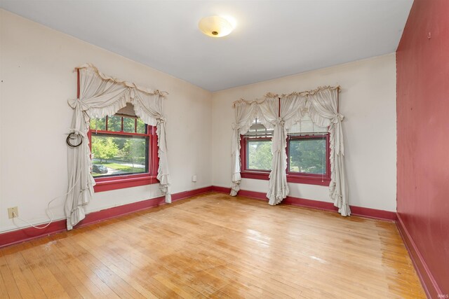 2131 Kensington Blvd, Fort Wayne, IN 46805 - unfurnished room featuring hardwood / wood-style floors and baseboards