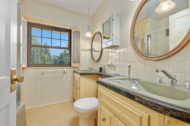 2131 Kensington Blvd, Fort Wayne, IN 46805 - full bath featuring tile walls, vanity, a shower, and tasteful backsplash