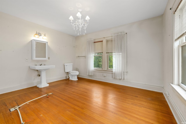 2131 Kensington Blvd, Fort Wayne, IN 46805 - bathroom with a chandelier and wood finished floors