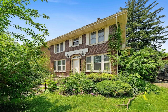 2131 Kensington Blvd, Fort Wayne, IN 46805 - view of front facade with brick siding and a chimney