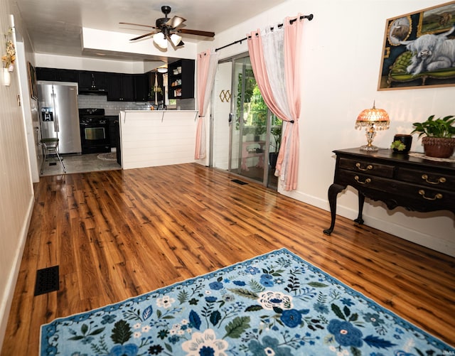 3945 W Walnut Leaf Dr, Bloomington, IN 47403 - living room featuring dark wood-style floors and a ceiling fan