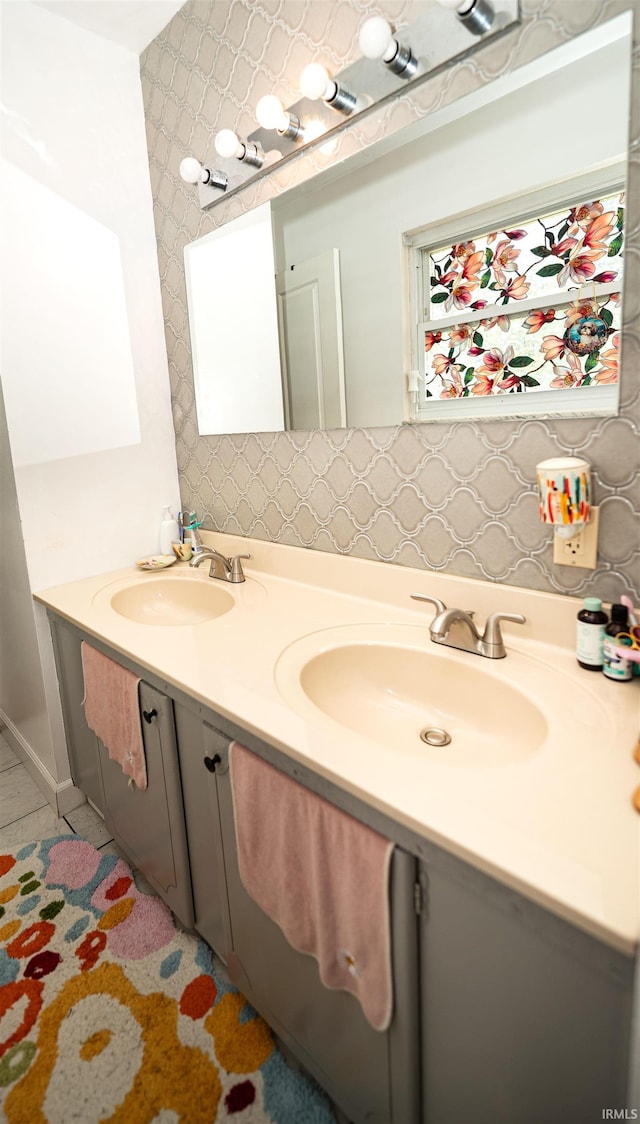 3945 W Walnut Leaf Dr, Bloomington, IN 47403 - bathroom with double vanity and baseboards