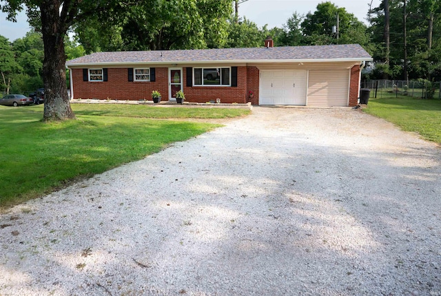 3945 W Walnut Leaf Dr, Bloomington, IN 47403 - single story home with an attached garage, driveway, and brick siding