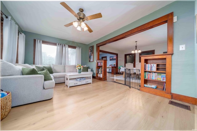 2220 N Huntington Rd, Marion, IN 46952 - living room with wood finished floors, a chandelier, and ceiling fan