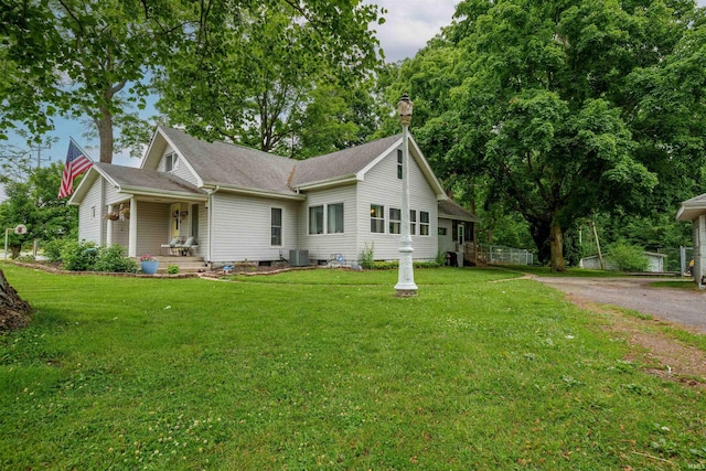 2220 N Huntington Rd, Marion, IN 46952 - view of property exterior featuring a lawn, driveway, and a shingled roof