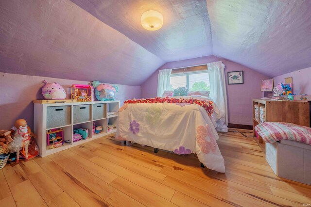 2220 N Huntington Rd, Marion, IN 46952 - bedroom featuring hardwood / wood-style flooring and vaulted ceiling