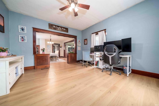 2220 N Huntington Rd, Marion, IN 46952 - office area featuring wood finished floors, a chandelier, and ceiling fan
