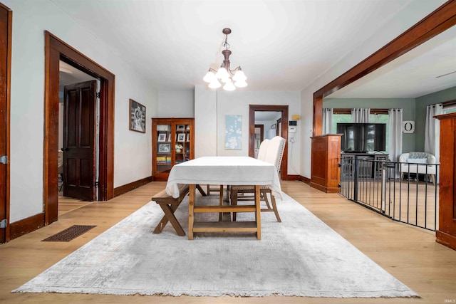 2220 N Huntington Rd, Marion, IN 46952 - dining space featuring a chandelier and light wood-style flooring