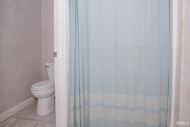 2433 Wheaton Dr, Evansville, IN 47725 - full bath featuring tile patterned flooring and curtained shower