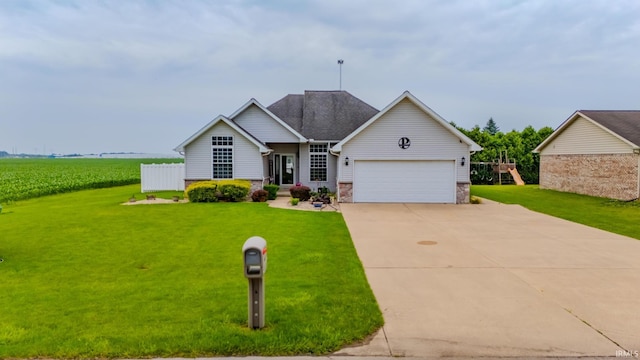 4450 Farmington Rd, Gas City, IN 46933 - view of front of house featuring a garage, concrete driveway, a front lawn, agricultural plots, and a rural view