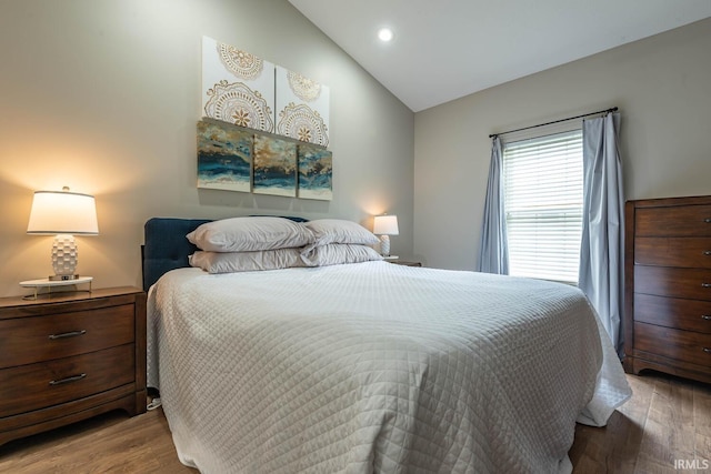 1423 W Westwind Ct, Bloomington, IN 47403 - bedroom with lofted ceiling, wood finished floors, and recessed lighting