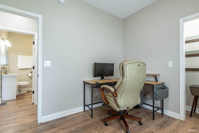 1423 W Westwind Ct, Bloomington, IN 47403 - home office featuring wood finished floors