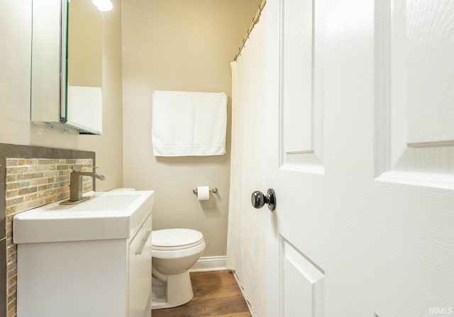 1423 W Westwind Ct, Bloomington, IN 47403 - bathroom featuring vanity and wood finished floors