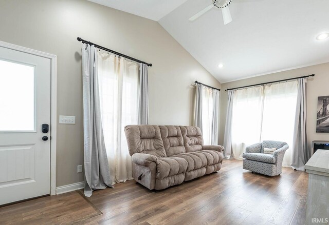1423 W Westwind Ct, Bloomington, IN 47403 - living room featuring plenty of natural light, lofted ceiling, wood finished floors, ceiling fan, and recessed lighting